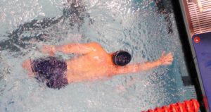 Swimmer crossing the finish line