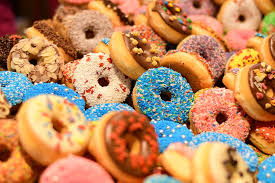 Picture of donuts in a bakery display case